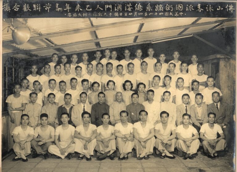 Black and White Photo showing Ip man with his students