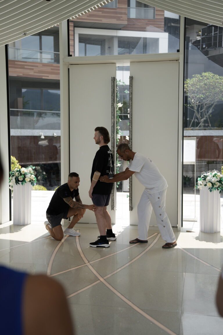 September Camp, Mindful Wing Chun. Two Sifu guiding a students stance