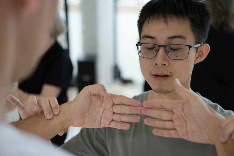 Image close up of hands and face while training